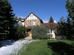 4.92 acres & Tudor Style Home in BEARSPAW